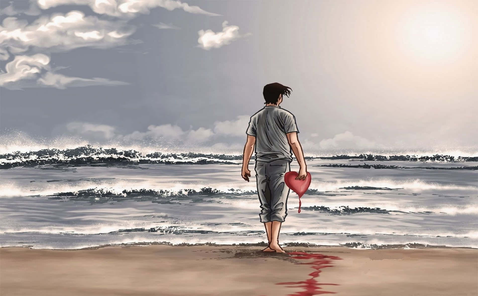 رجل علي الشاطئ يحمل قلبة الحزين